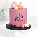 fall inspired cake with personalised lettering and fondant pumpkin cake toppers